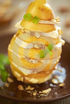 Pear with camembert, chopped almonds and honey