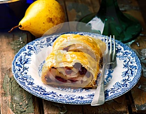 Pear and cranberry strudel .selective focus.