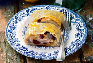 Pear and cranberry strudel .selective focus.