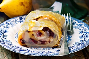 Pear and cranberry strudel .selective focus.