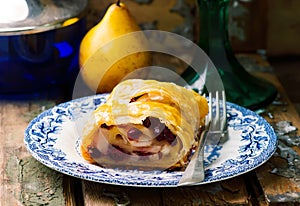 Pear and cranberry strudel .selective focus.