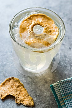 Pear Juice Cocktail with Dried Pear Slice and Crushed Ice.