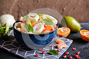 Pear salad with fennel, mandarins and pomegranate