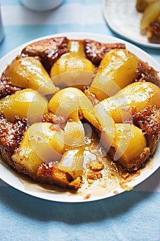 Pear tarte tatin. Upside down cake with caramel and pears.