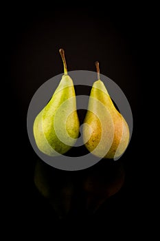Pear, Two Pears on black background with reflections, copy space