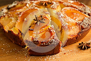 Pear upside down cake with a slice cut out