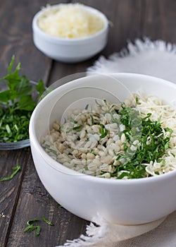 Pearl barley with cheese and herbs