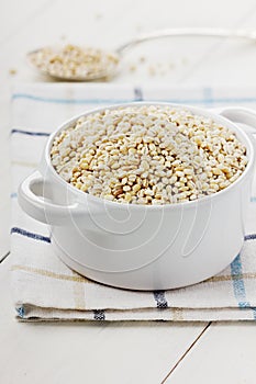 Pearl barley in a white ceramic bowl