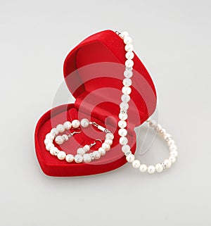 Pearl bracelet earring and necklace isolated