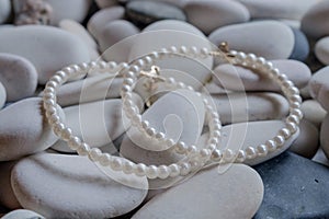 Pearl decoration on pebbles