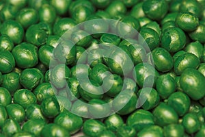 Pearl green plastic particles