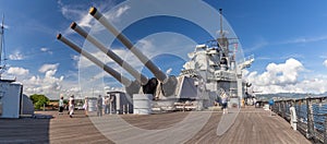 Pearl Harbor, Hawaii, USA - September 24, 2018: Panoramic shot of huge cannons and deck of USS Missouri docked in Pearl Harbor.