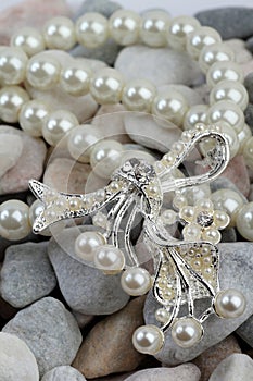Pearl jewelery on stones photo