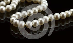 Pearl necklace on black