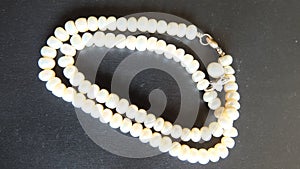 Pearl necklace with black back ground