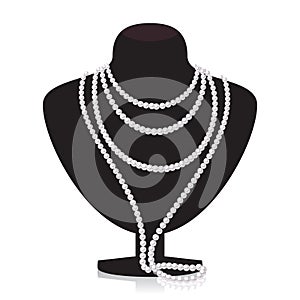 Pearl necklace on black mannequin