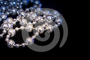 Pearl necklace isolated on dark