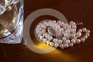 pearl necklace and precious stone