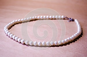 Pearl. Pearl necklace. A snow-white pearl necklace. Jewelry for girls. Jewelry for women. Women`s pearl necklace.