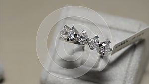 Pearl ring shine diamonds. D color pearl ring in jeweler shop close up five stone diamond