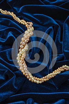 Pearls on blue velvet