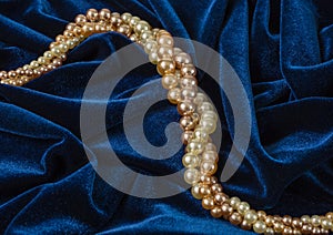 Pearls on blue velvet