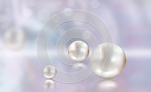 Pearls with reflection on abstract mother of pearl background