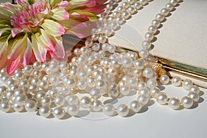 Pearls and vintage purse photo