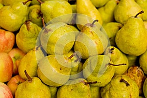 Pears in a box on the market.