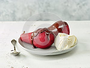 Pears poached in red wine