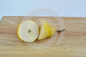 Pears, two pieces of cut half pear