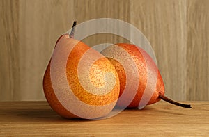 Pears on wood background