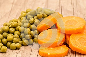 Peas and carrot rings close-up