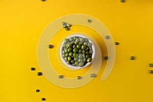 peas in a white bowl photo