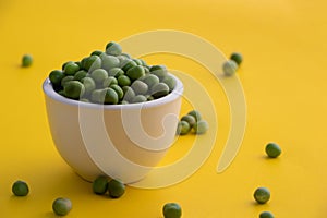 peas in a white bowl photo