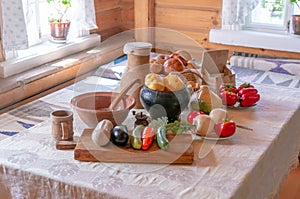 Peasant russian rural food with vegetables in country house