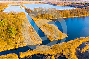 Peat lands aerial. Beautiful spring landscape. Bright sun shining above rural area