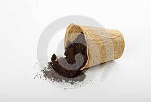 Peat pot isolated on white background. Seedling preparation