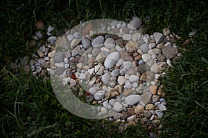 Pebbel stones in the green grass