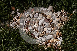 Pebbel stones in the green grass