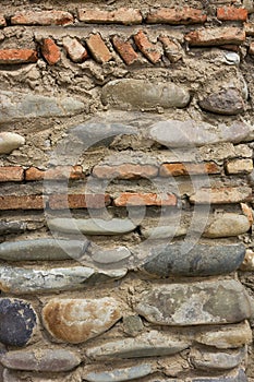 Pebble background texture, ancient stone wall