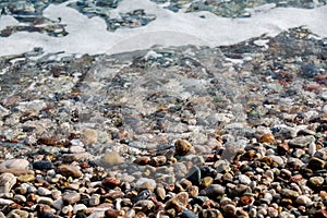 Pebble beach on the famous turkish Konyaalti Beach, Antalya, Turkey