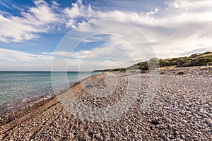 Pebble beach on the Greek island of Rhodes