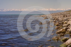 Pebble beach on Issyk-kol lake. Kyrgyzstan.