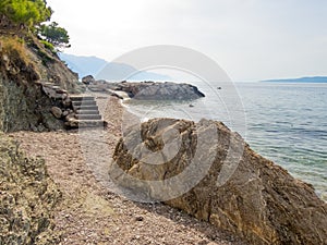 Pebble beach and Rock formations in Marusici