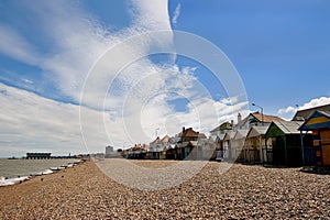 Pebble beach with a row of small huts