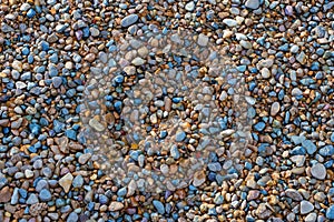 Pebble beach texture. High resolution photo. colorful small pebble, stone backgrounds. texture of beach with coarse sand