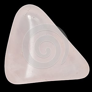 Pebble of rose quartz macro isolated