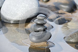 Pebble stack on the beach the stones represent balance and wellbeing of the mind