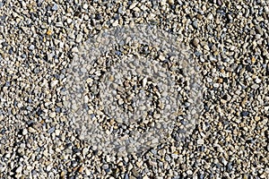 Pebble stone background, closeup top view of pebble stones